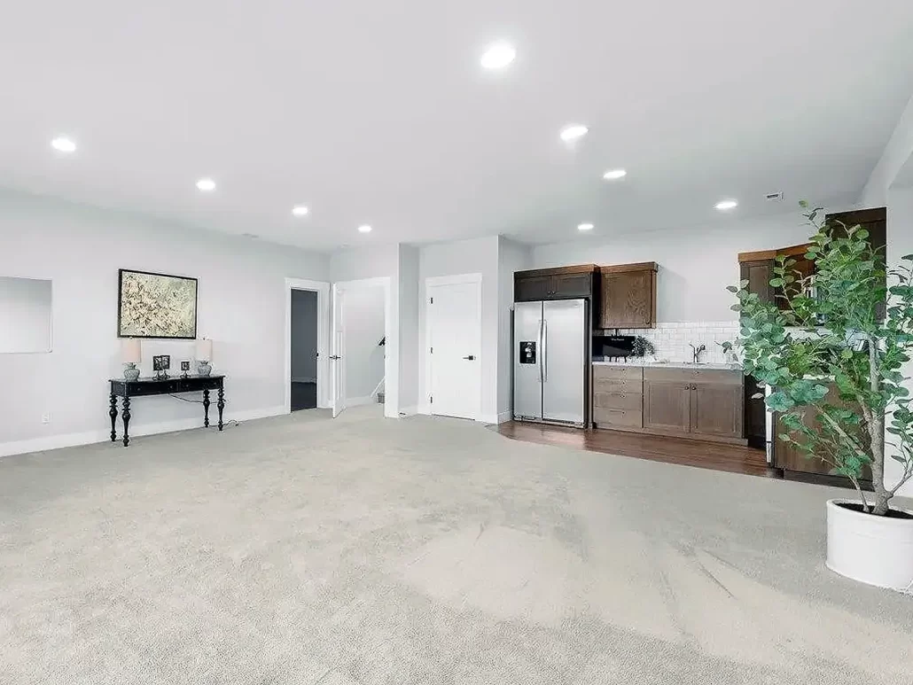 Utah Basement Family Room with a small wet bar